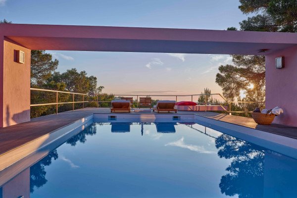 Modern villa with stunning views in a quiet and very private location, nested between Cala Tarida and Cala D'hort